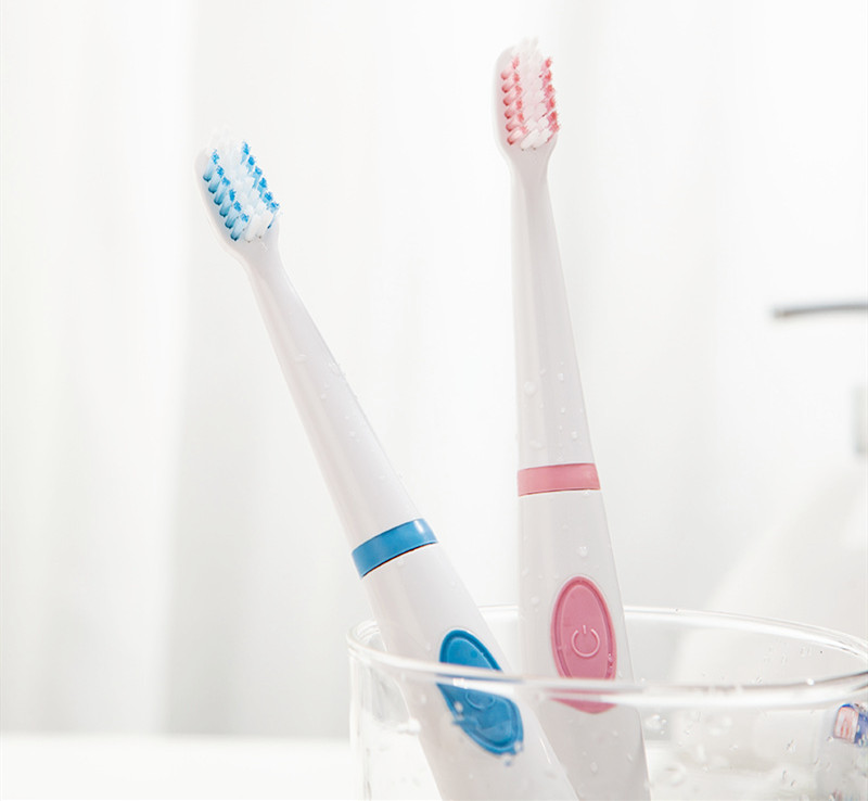 What is the right way to brush your teeth with an electric toothbrush